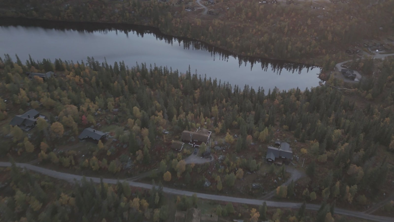 Aerial view of cabins by a lake, Eggedal